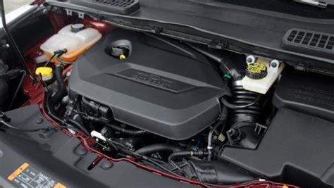 View of the engine bay of a 2016 Ford Escape, showcasing various components