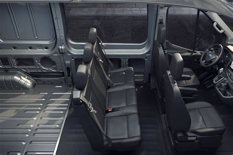 Interior view of the 2023 Ford Transit van cabin with driver and dashboard