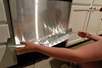 Applying Contact Paper to Refrigerator