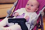Baby with a Gun Meme