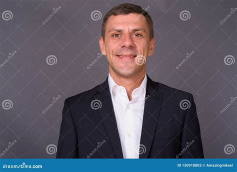 Businessman with short and tidy hair and smiling