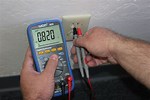 Checking Wall Outlet with Multimeter