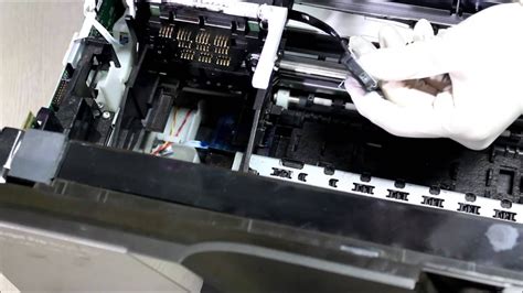 Cleaning printer sensor