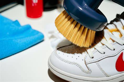 Cleaning sneakers with brush