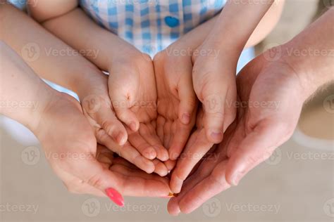 Family holding hands together