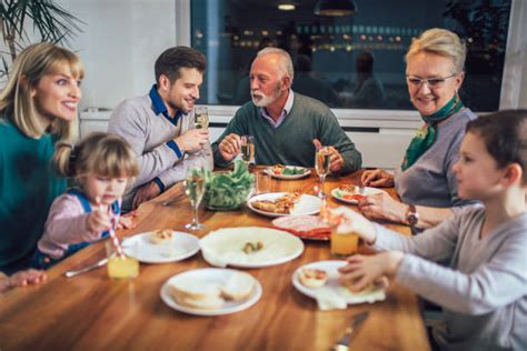 Family talking at dinner table