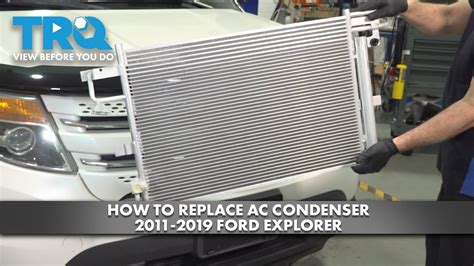 Professional mechanic performing Ford Explorer AC repair.