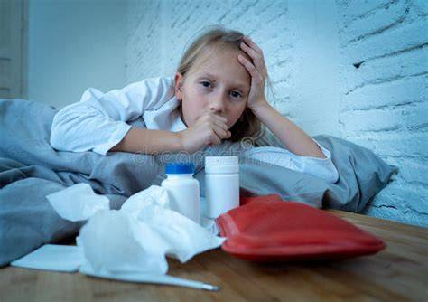 Girl feeling sick in bed