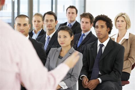 Group of people listening to a presentation