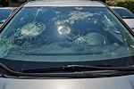 Hail Storm Damages Car