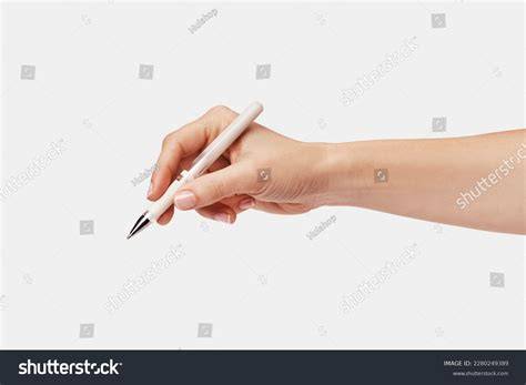 Hand holding pen