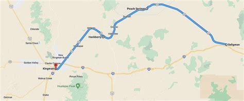 How far is Seligman from Kingman