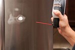 How to Remove Dent From Stainless Fridge Door