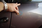 How to Repair Small Dent in Car Door