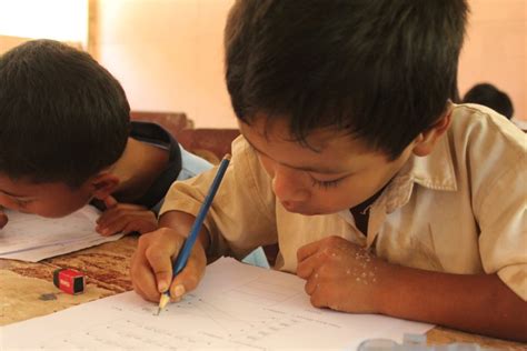 Indonesian children studying in a class