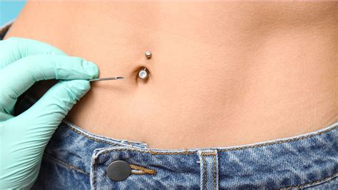 Is burning belly button piercing normal