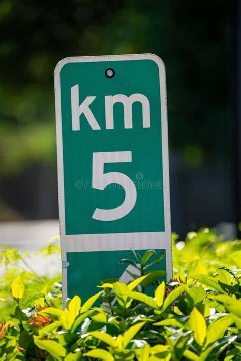 Kilometer sign on road