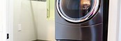 Laundry Room with Stackable Washer and Dryer