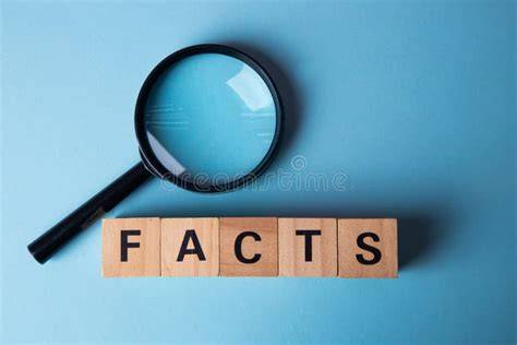 Magnifying glass focusing on facts