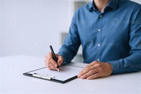 Man filling out form