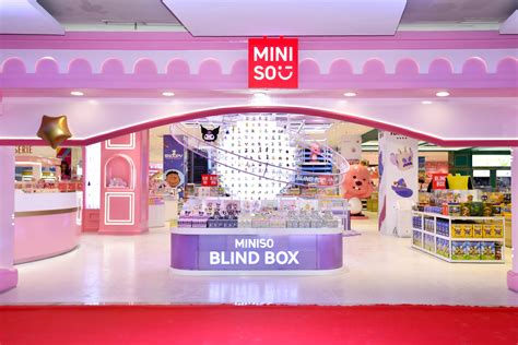 Miniso store front with people walking by