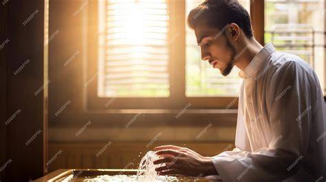 Muslim man performing wudhu