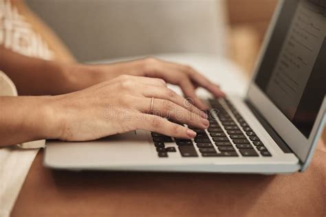 Person Typing on Laptop