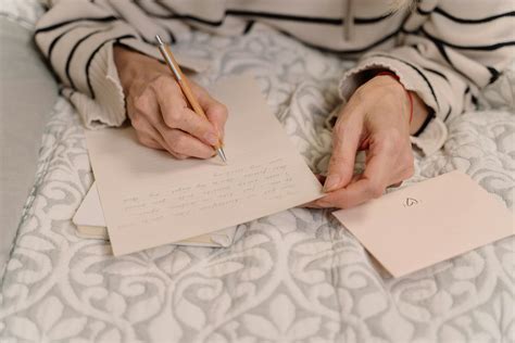 Person Writing Letter