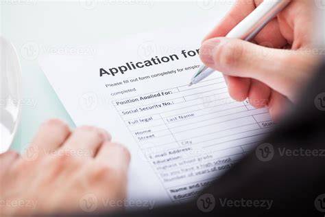 Person filling out a form