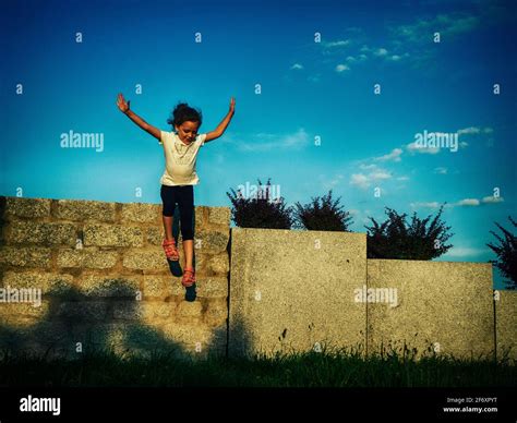 Person jumping off a wall