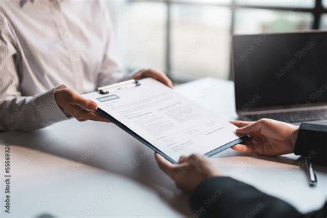 Person preparing documents for job application