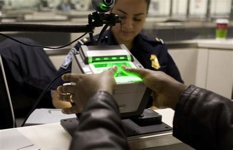 Security officer checking fingerprint