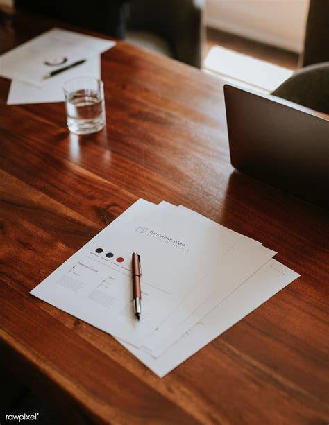 Signing a Document on a Desk