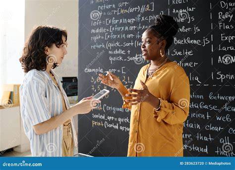 Student and teacher discussing