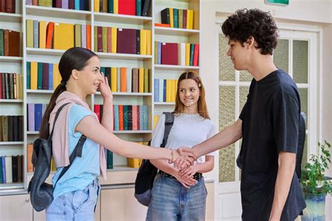 Students shaking hands