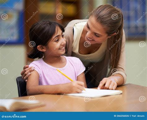 Teacher Helping Student