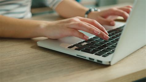 Typing on Laptop
