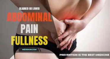 What causes fullness in lower abdomen