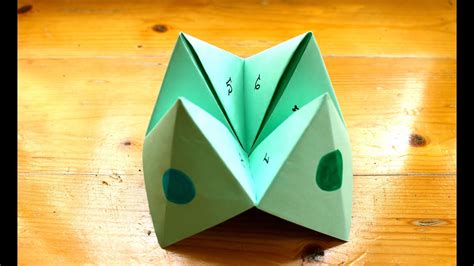 What is the folded paper game called