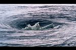 Whirlpool in Ocean Swallowing Ships