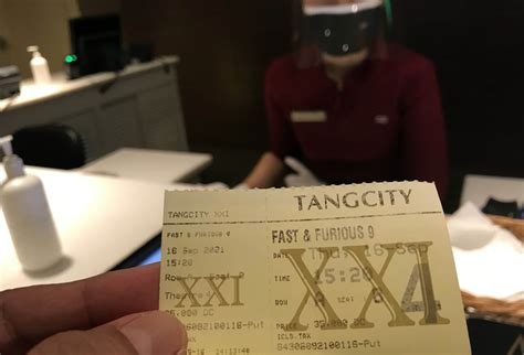 XXI Ticket