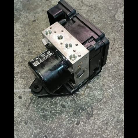 abs module reprogramming cost