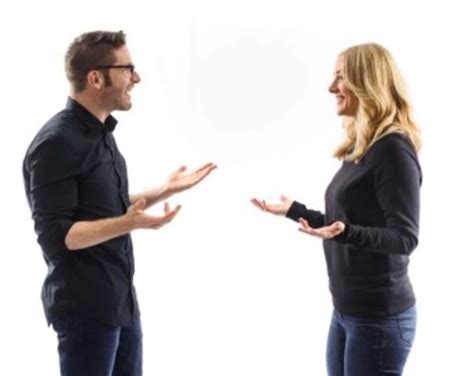 Two people sitting on a couch, subtly mirroring each other's posture