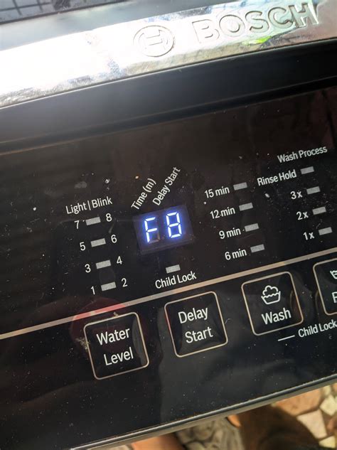bosch top loading washing machine f8 error code reset