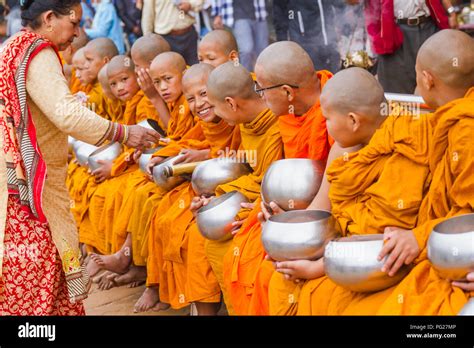 buddhist monks helping