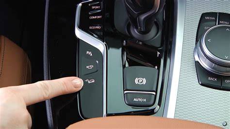 Relevant image of Hill Descent Control button in a car