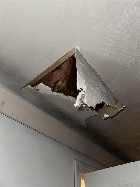 ceiling with large hole in it