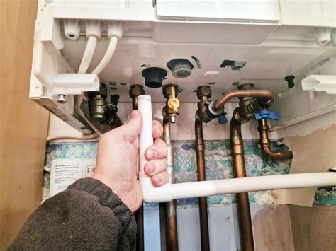 combi boiler leaking water from overflow pipe