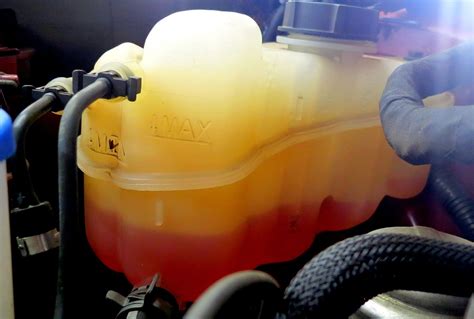 coolant overflow tank leaking