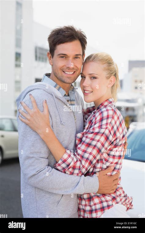 Couple hugging and smiling